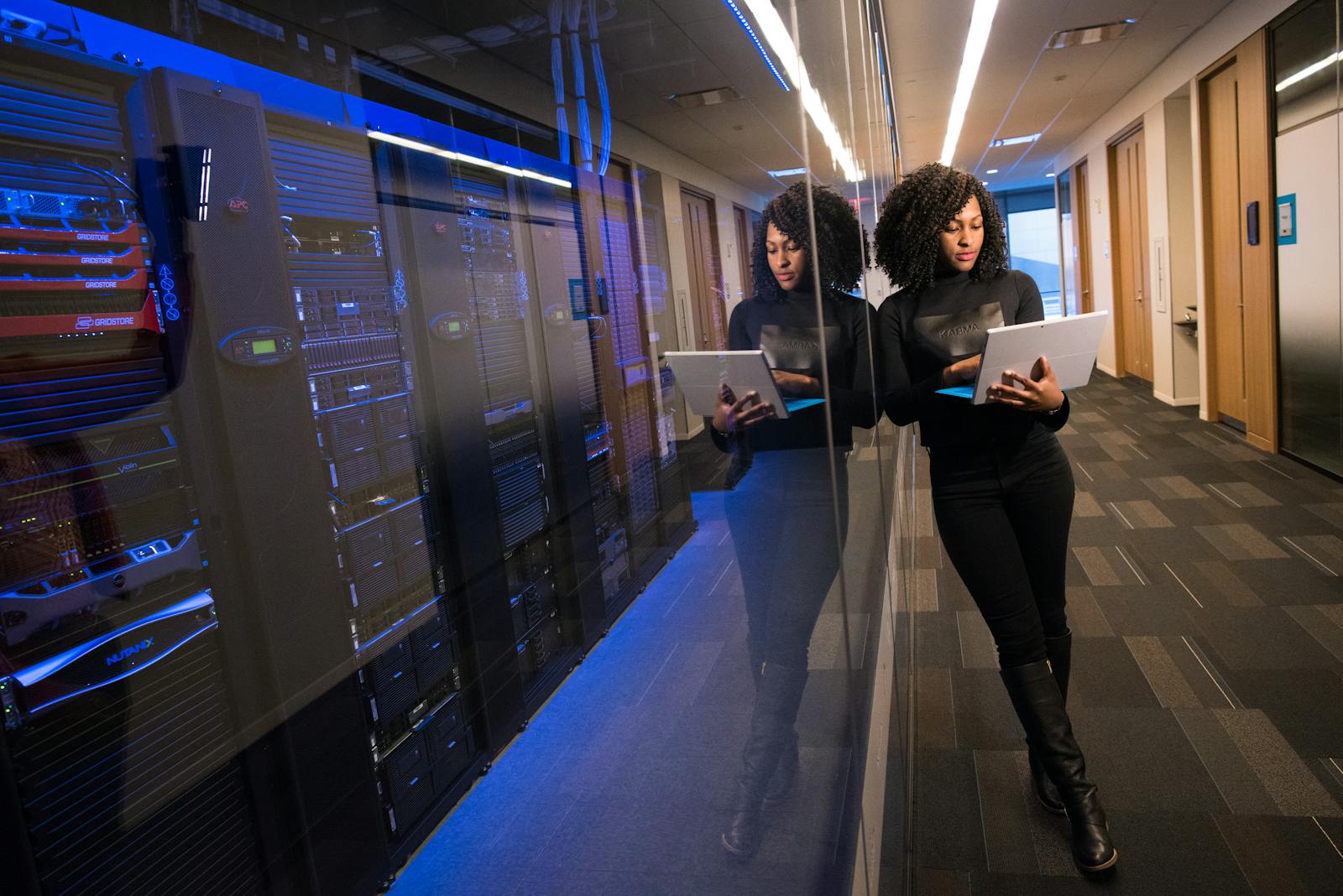 IT engineer working on servers in a modern data center