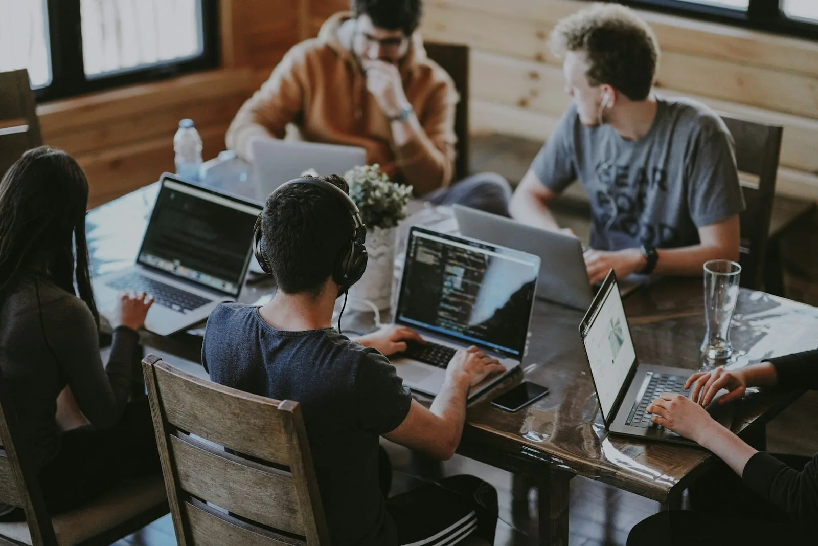 Growing team collaborating across a modern Hyderabad office workspace